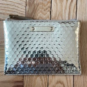 Gold Kate spade cosmetic pouch